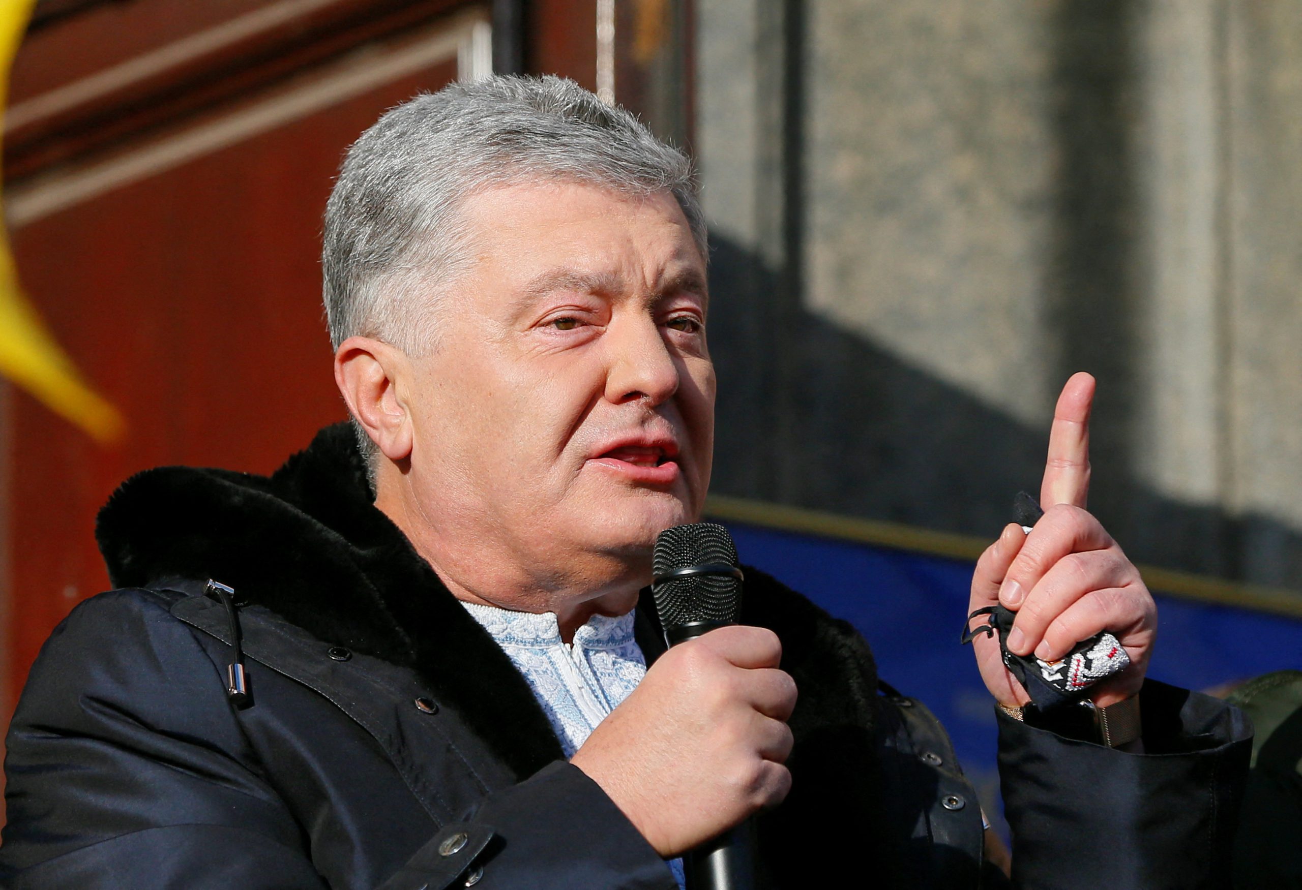 Ukrainian former President Petro Poroshenko, who is suspected of high treason by financing pro-Russian separatists in eastern Ukraine while in office in 2014-2015, addresses his supporters outside a court building before a hearing in Kyiv, Ukraine January 19, 2022. REUTERS/Gleb Garanich
