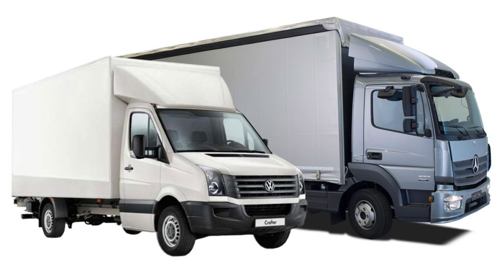 Білий вантажний автомобіль Volkswagen Crafter та сіра вантажівка Mercedes-Benz на білому фоні